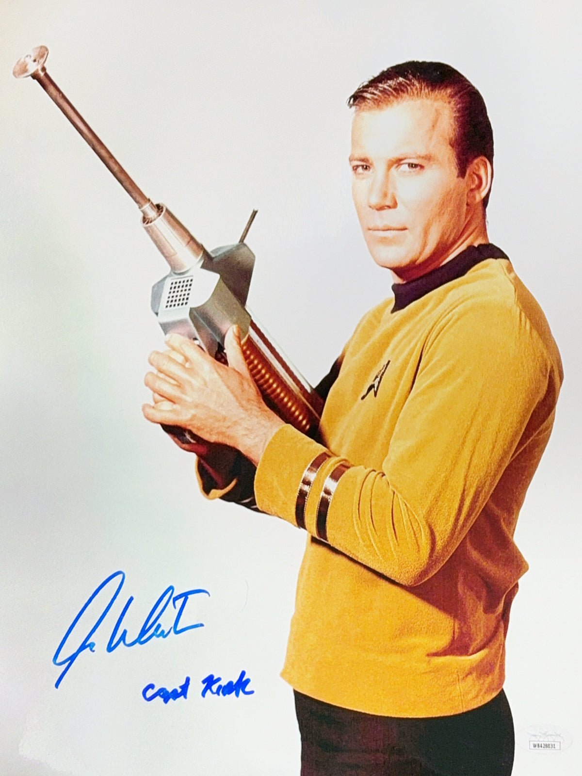 William Shatner Autographed Star Trek "Capt Kirk" Inscribed Gun White Background Vertical 11x14 JSA product image 1,